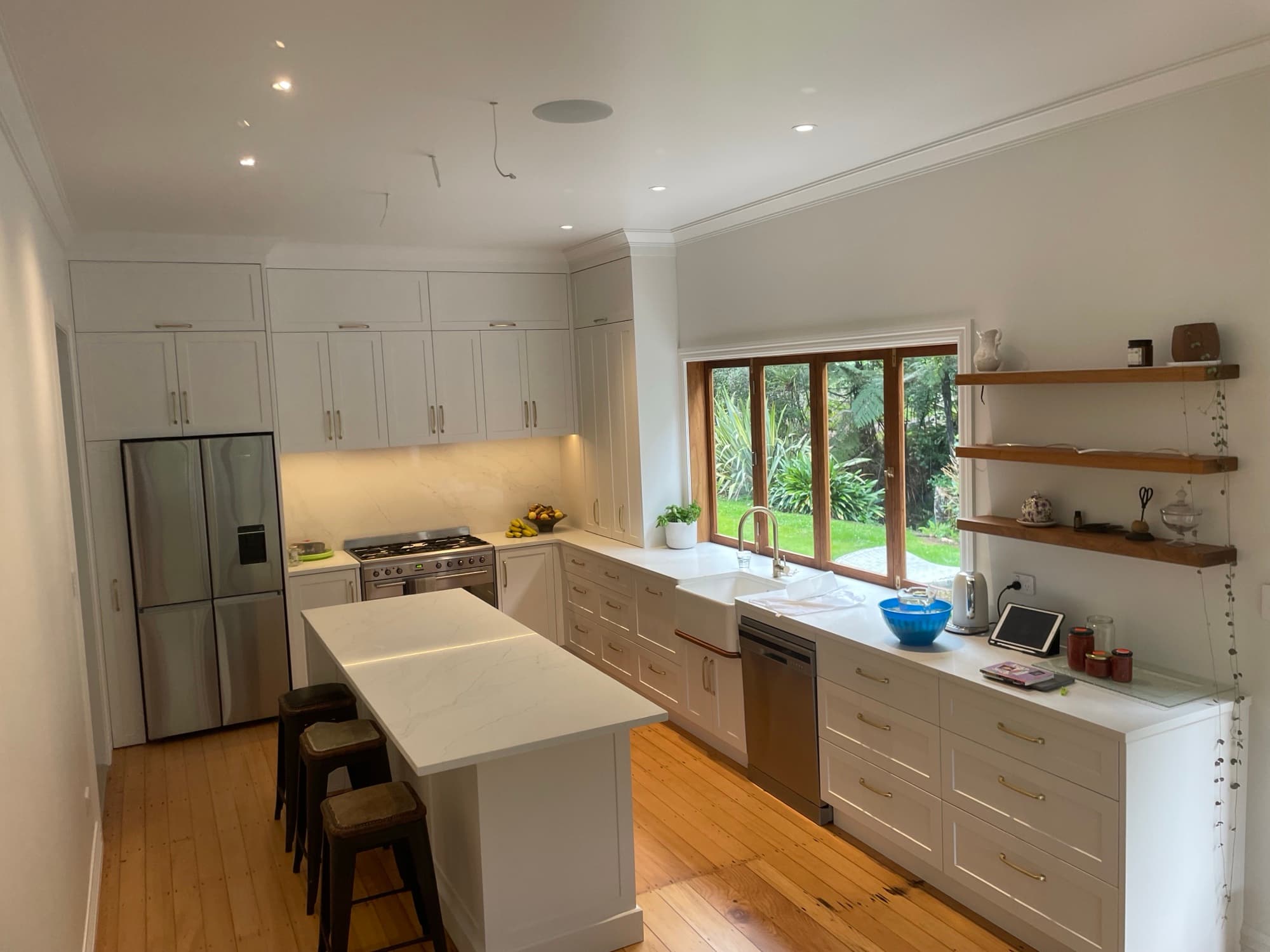 Kitchen renovation detail with natural light and crafted cabinetry