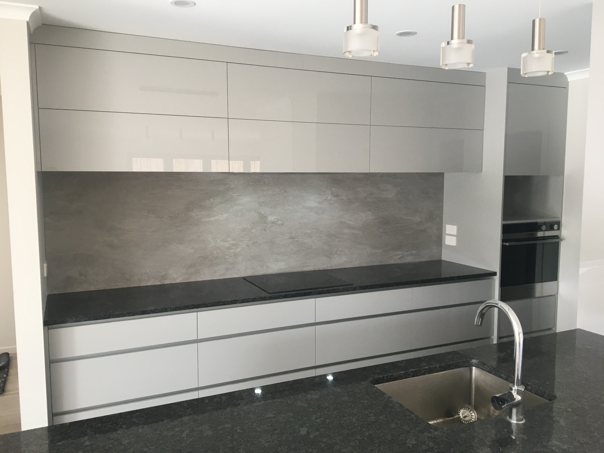 Tauranga Grey Gloss Kitchen — Kitchen Renovation in Tauranga by The Joinery Edit